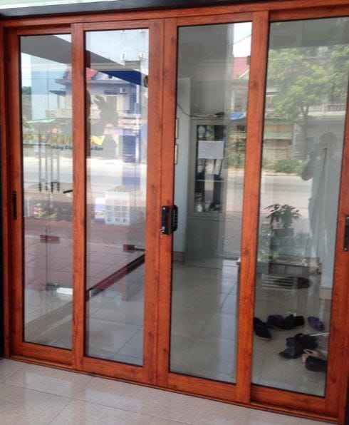 báo giá cửa nhôm kính giả gỗ tphcm